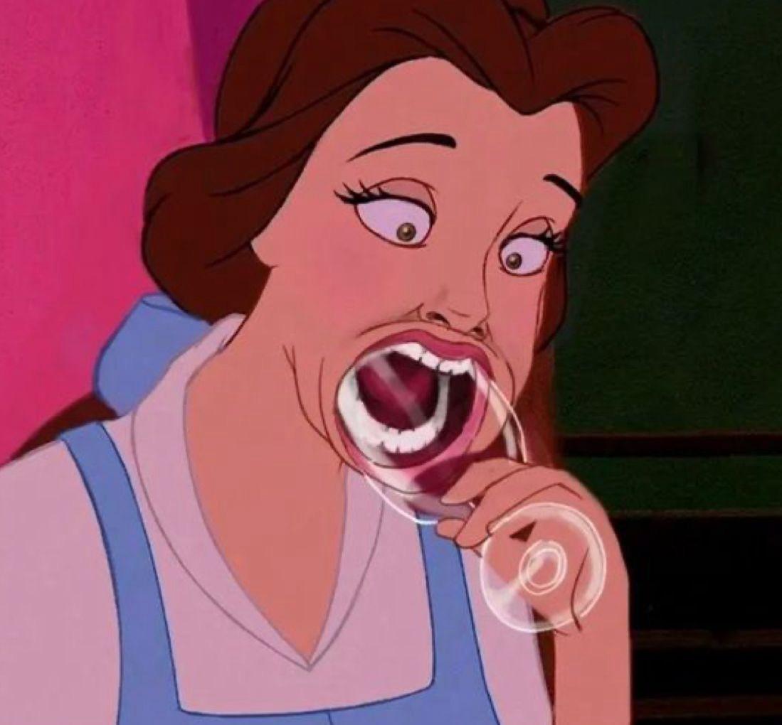 Belle with a glass in her mouth